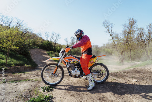 Man riding motorbike on motocross track.Extreme and Adrenaline. Motocross rider in action. Motocross sport. Active lifestyle © arthurhidden