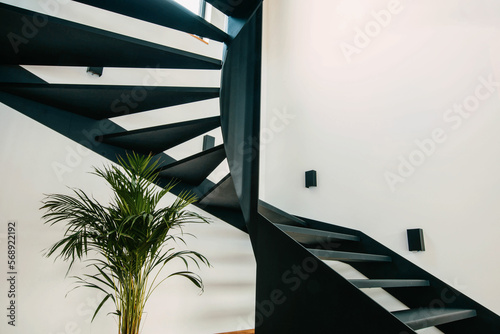 Black steel stairs in an industrial style in a modern house photo