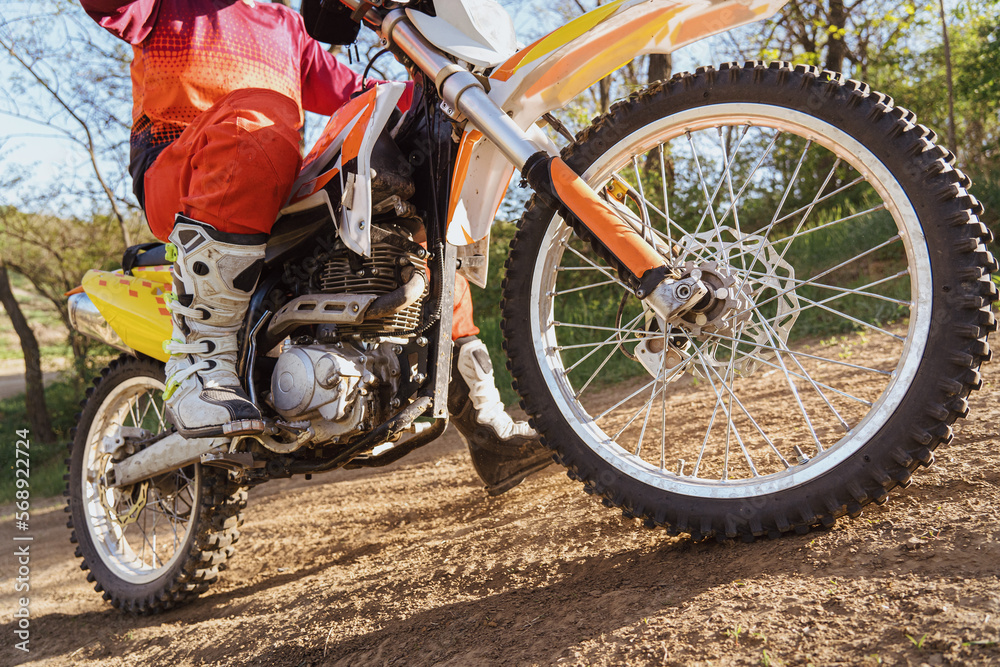 Man riding motorbike on motocross track.Extreme and Adrenaline. Motocross rider in action. Motocross sport. Active lifestyle