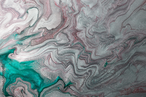 Elegant marble metallic silver background,make from liquid nail polishes.Textured surface,looks like reptile skin.Good as cosmetics backdrop.
