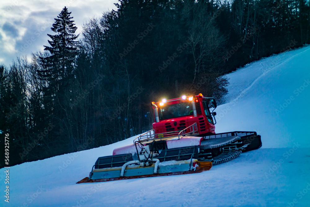 snowcat pistenbully in a ski resort the austrian alps Stock Photo
