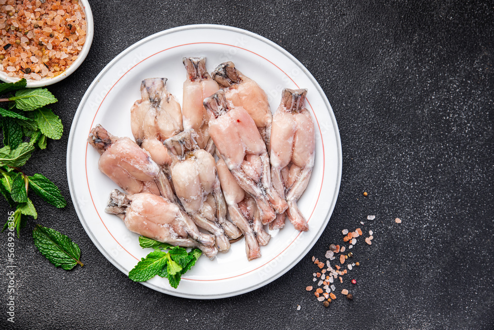 frog leg frozen meat frozen food meal food snack on the table copy space food background rustic top view frog leg frozen meat frozen food meal food snack on the table copy space food background rustic top view