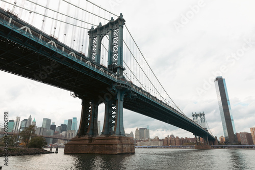 Manhattan bridge and skyline with skyscrapers of New York City on background. © LIGHTFIELD STUDIOS