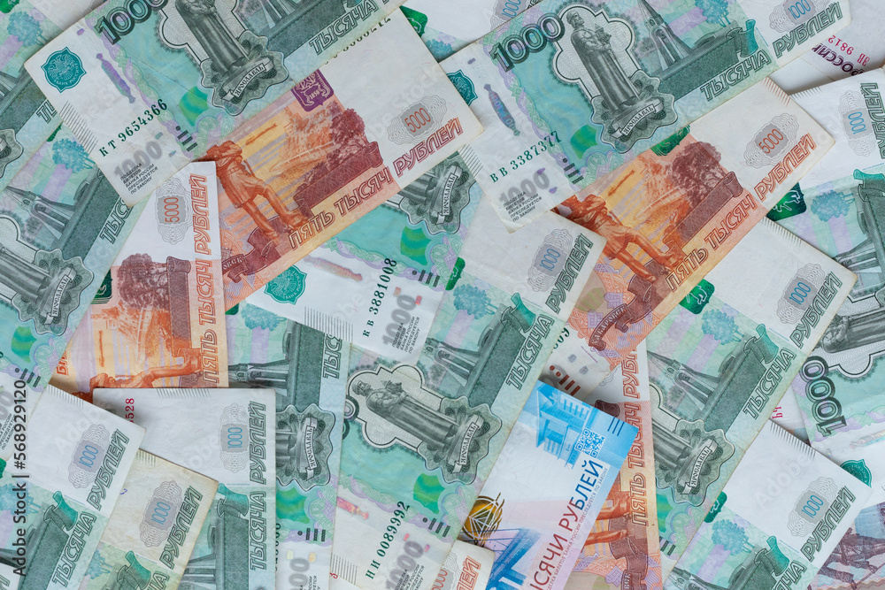 Russian money. Different denomination of bills. Close-up of Russian rubles. Finance concept. Money background and texture. Copy space. Russian money. Different denomination of bills. Close-up of Russian rubles. Finance concept. Money background and texture. Copy space.
