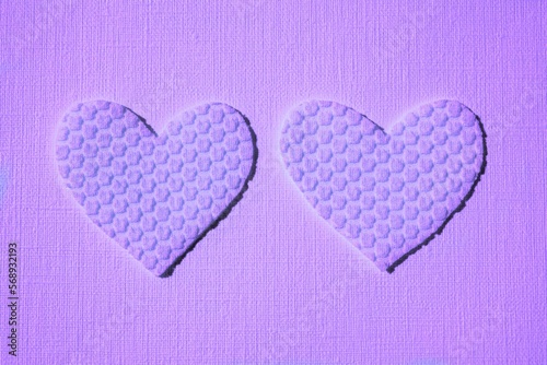 cute pink heart made of textured material on table