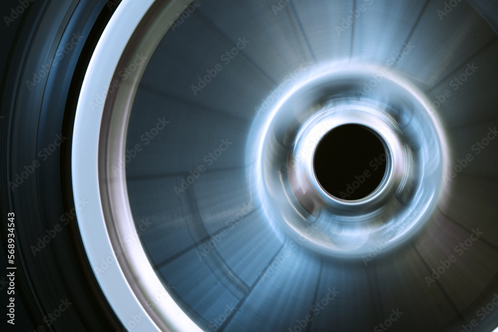 old car wheels titanium rims long exposure video on dark background spinning motion simulation