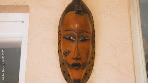 Black Stock Footage of historic African Art, Masks, Artifacts, and Sculptures in a home museum showcasing the diversity of African descendents, cultures, and creativity photo