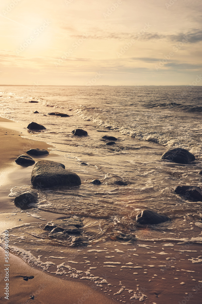 Baltic sea beach at sunset, color toning applied, Poland. Baltic sea beach at sunset, color toning applied, Poland.