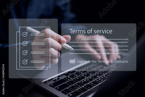 Terms of service paper showing on laptop business agreement theme