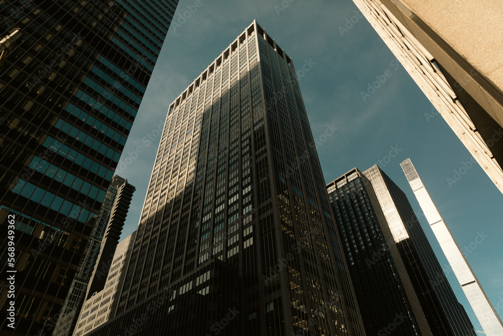 low angle view of modern skyscrapers in Manhattan district of New York City.