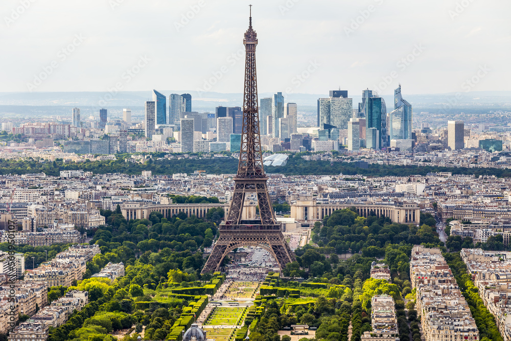 The Eiffel Tower in Paris and the panorama of La Defense business district, France