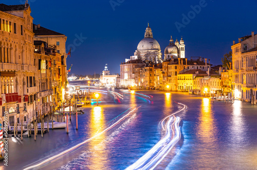 Santa Maria della Salute Basilica on the Grand Canal in Venice at night, Italy