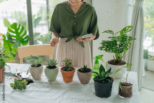 Woman taking care of plants