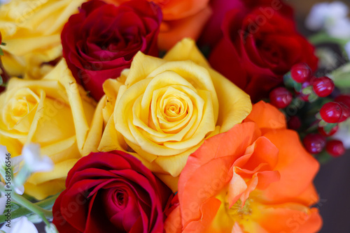Bouquet of red  yellow and orange roses