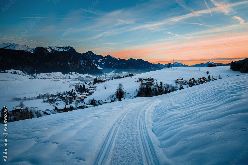 Sunrise in a winter, mountain village in Austria. Sunrise in a winter, mountain village in Austria.