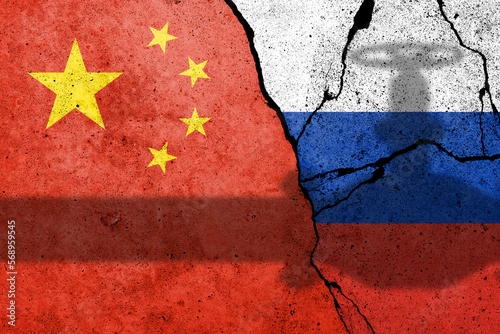 Canvas Print Flag of China and Russia painted on a concrete wall