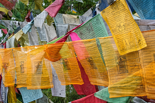 Prayer flags on Dochula Pass;  Bhutan photo