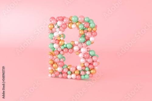 Letter B made of glass balls, pastel pearls, crystal jewels and gold. photo