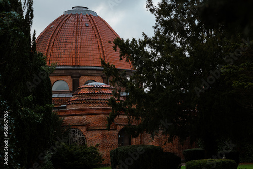 Horizontal shot of traditional red brick building dansekapellet in Bispebjerg Kirkegaard in Copenhagen Denmark	
