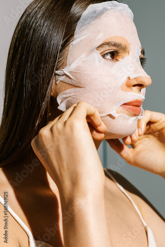 A woman with a moisturizing face mask