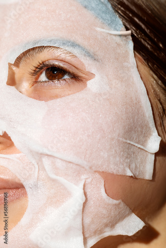 A woman with a moisturizing face mask