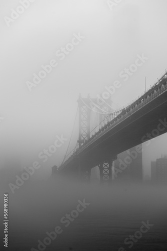 Manhattan bridge on a misty day photo