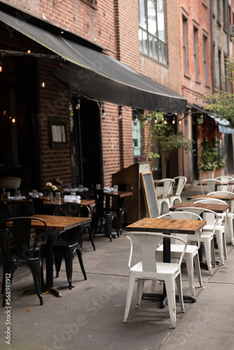 Outdoor cafe on urban street in New York City. © LIGHTFIELD STUDIOS