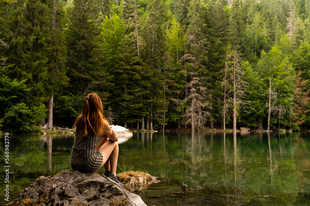 Woman relaxing in nature lake Woman relaxing in nature lake