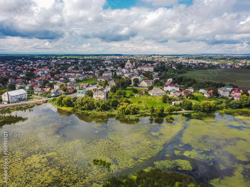 Aerial vIew of Khodoriv city by drone. Summer Ukraine Lviv region, West Ukraine. Lake.