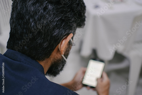 Man looking at the phone