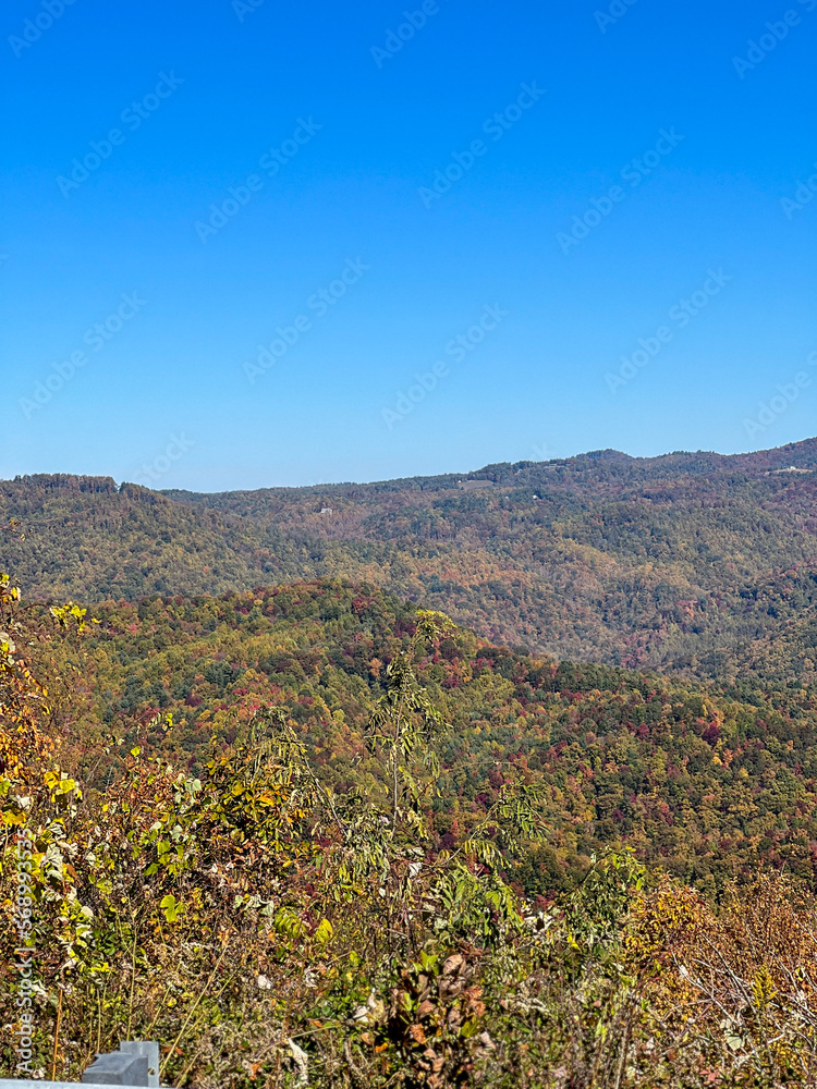 An overlook on the Blue Ridge Parkway in Boone, NC during the autumn fall color changing season.