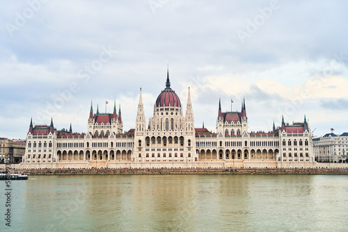 Hungarian Parliament Building in the evening at the Danube river in Budapest, Hungary. High quality photo