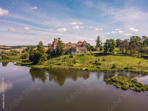 Aerial view by drone. Summer. Svirzh Castle Ukraine Castles. Lakes. 