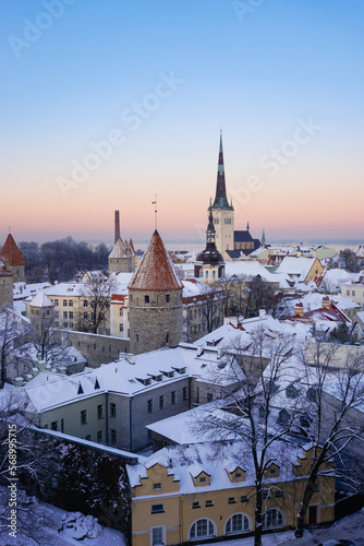 Winter sunset in Tallinn with snow and blue sky