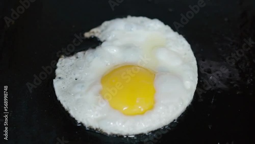 A beaultiful egg being grilled photo
