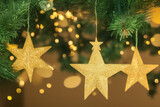 Six golden Christmas decoration stars hanging isolated
