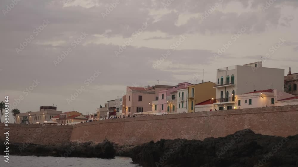 time lapse of a seaside village with ancient walls at sunset time lapse of a seaside village with ancient walls at sunset