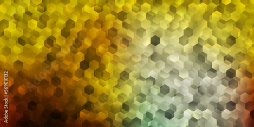 Light blue, yellow vector backdrop with a batch of hexagons.
