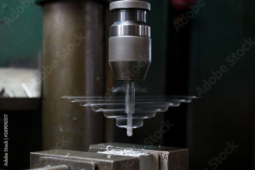 Part machining with drilling machine