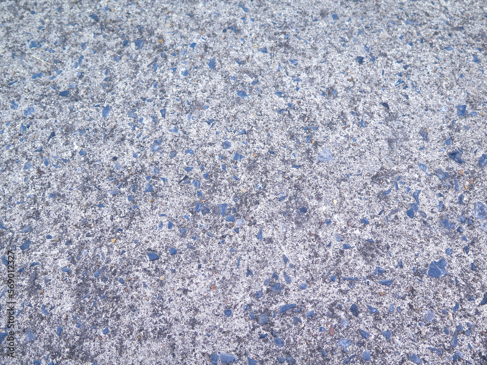 the grey cement ground with little blue stones for decorating background and wallpapers and artworks the grey cement ground with little blue stones for decorating background and wallpapers and artworks