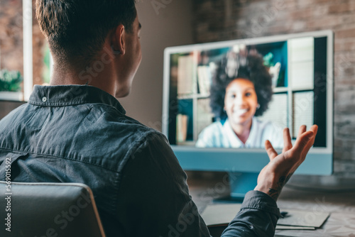 Tableau sur toile View over shoulder employer listen applicant at job interview online use cam and pc