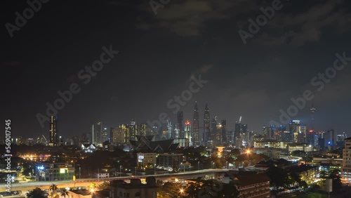 Wallpaper Mural Aerial view hyperlapse 4k video of Kuala Lumpur city center view during earth hour night overlooking the city skyline in Federal Territory, Malaysia. Pan right motion timelapse. Torontodigital.ca