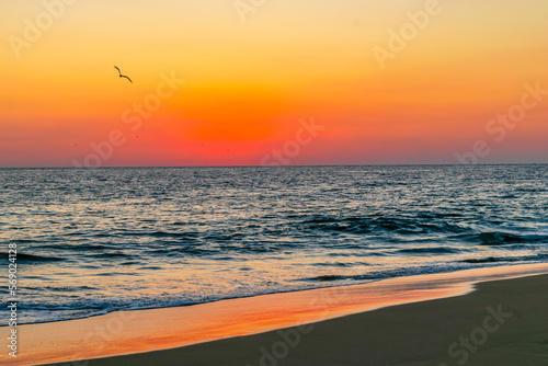 Beautiful golden sunset in Acapulco photo