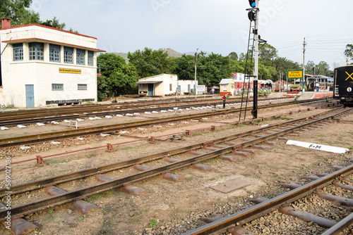 View of Toy train Railway Tracks from the middle during daytime near Kalka railway station in India, Toy train track view, Indian Railway junction, Heavy industry photo