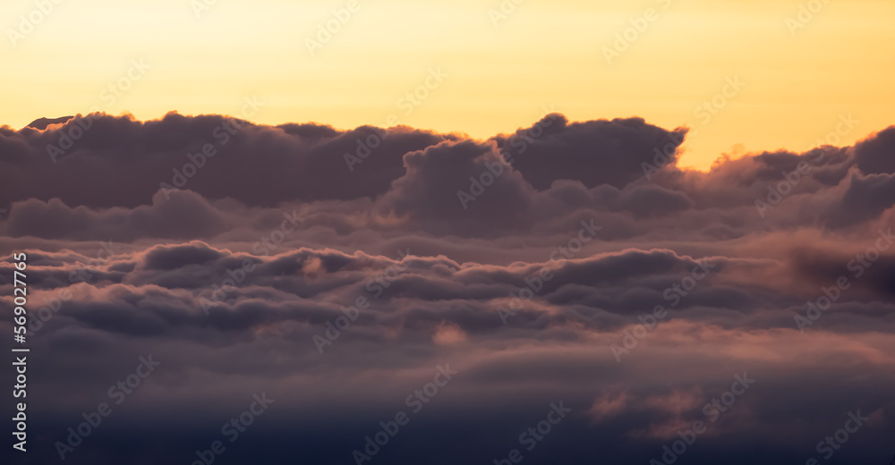 Aerial Cloudscape during morning Sunrise Sky. British Columbia, Canada. Nature Background