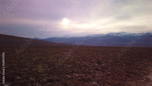 Gimbal booming down shot of the Badwater Basin salt flats in Death Valley, California. 4K photo