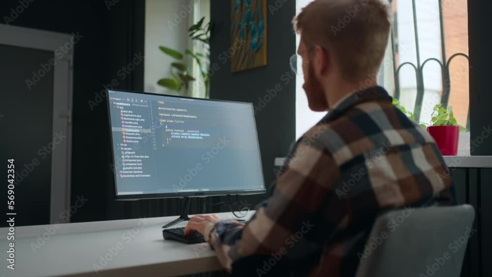 data scientist writing code, working in office IT company or freelancer in home, view over shoulder data scientist writing code, working in office IT company or freelancer in home, view over shoulder