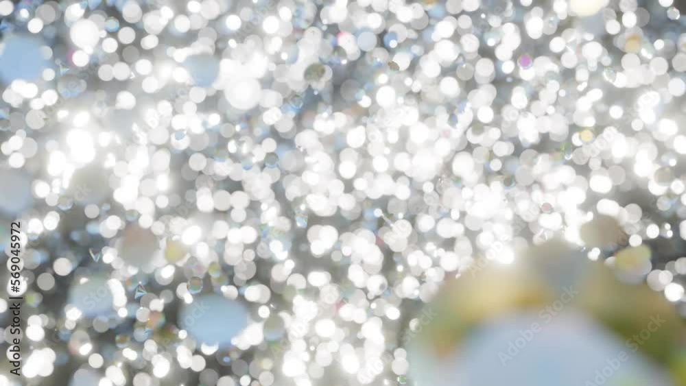 Diamond particles falling. 4K diamond dust particles falling in slow motion. Abstract diamond motion background. Thousands of diamonds shinning and sparkling as they slowly fall. Diamond particles falling. 4K diamond dust particles falling in slow motion. Abstract diamond motion background. Thousands of diamonds shinning and sparkling as they slowly fall.