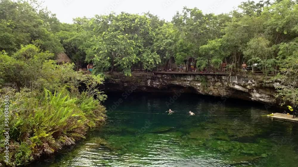 Drone aerial video clear underwater cave. Riviera Maya are unique places for unique journey among mysterious tropical forest. Concept outdoor nature footage. Drone aerial video clear underwater cave. Riviera Maya are unique places for unique journey among mysterious tropical forest. Concept outdoor nature footage.