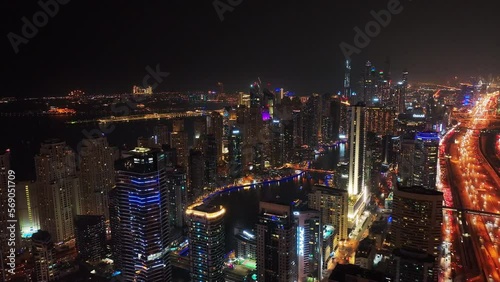 Wallpaper Mural Aerial view of buildings in modern urban borough. Revealing of busy wide multilane highway leading through night city. Torontodigital.ca